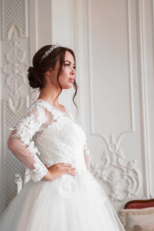 ride's preparation before the wedding n her bedroom in a morning. Honeymoon