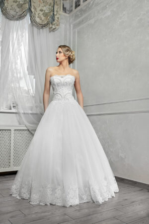 Young beautiful bride, woman in long white wedding dress on whit White Star